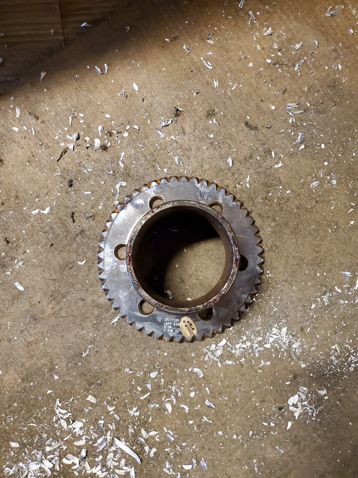 Machined opening in a custom metal component