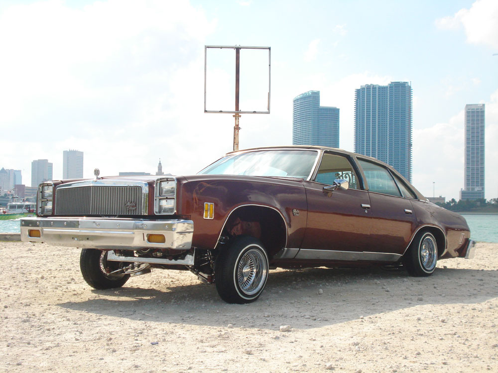 Build 005 — Supreme: 1990 Caprice on 30 inch wheels with blue pearl paint