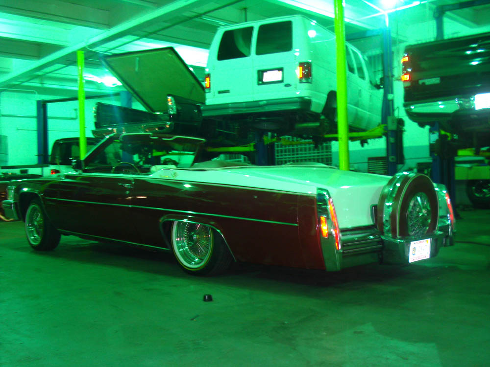 Build 006 — White Ghost: 1996 Fleetwood on 24 inch wheels with ghost pearl paint