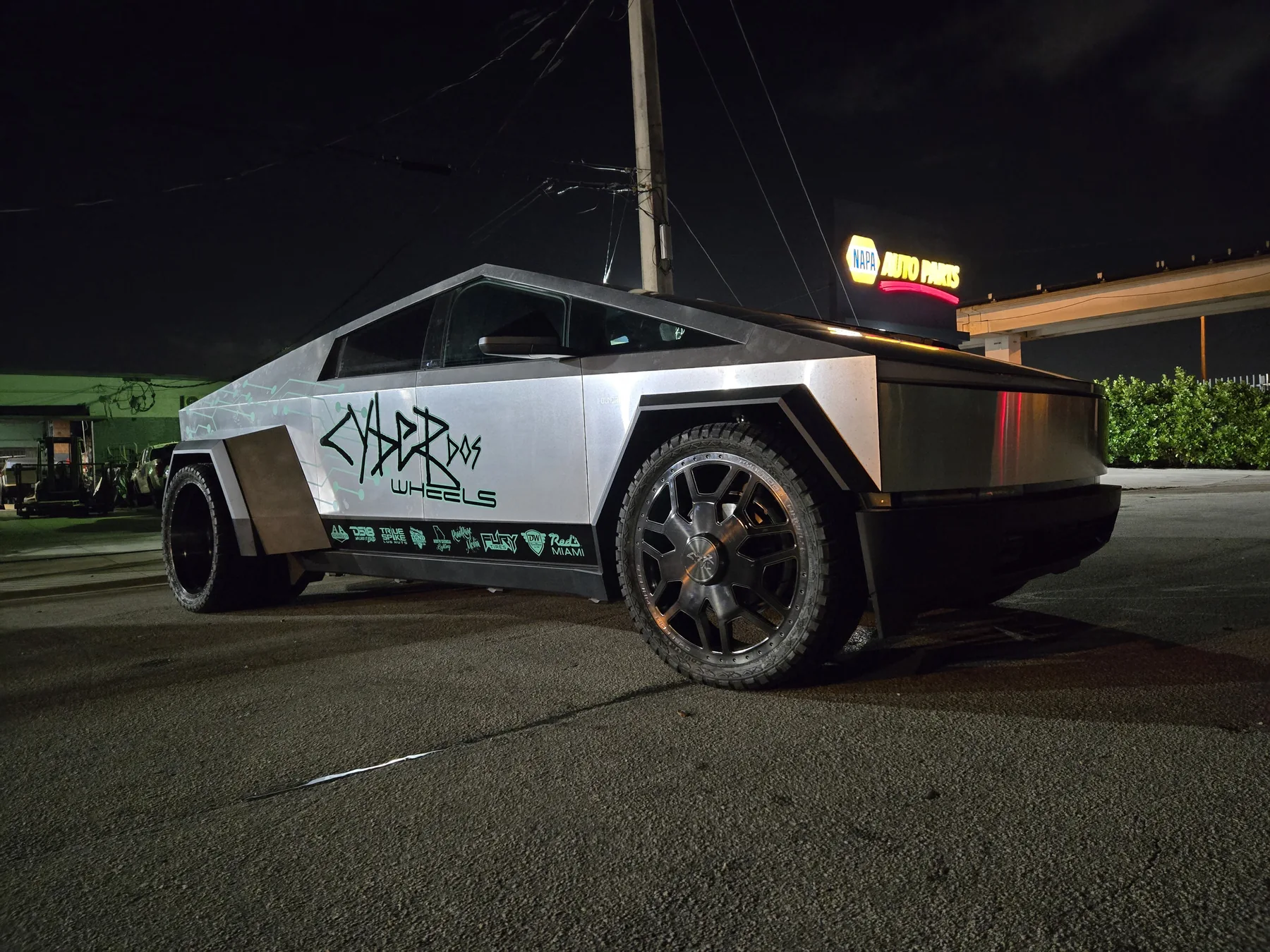 Cyber Dos Wheels Cyber Dually under shop lights in a front three-quarter view